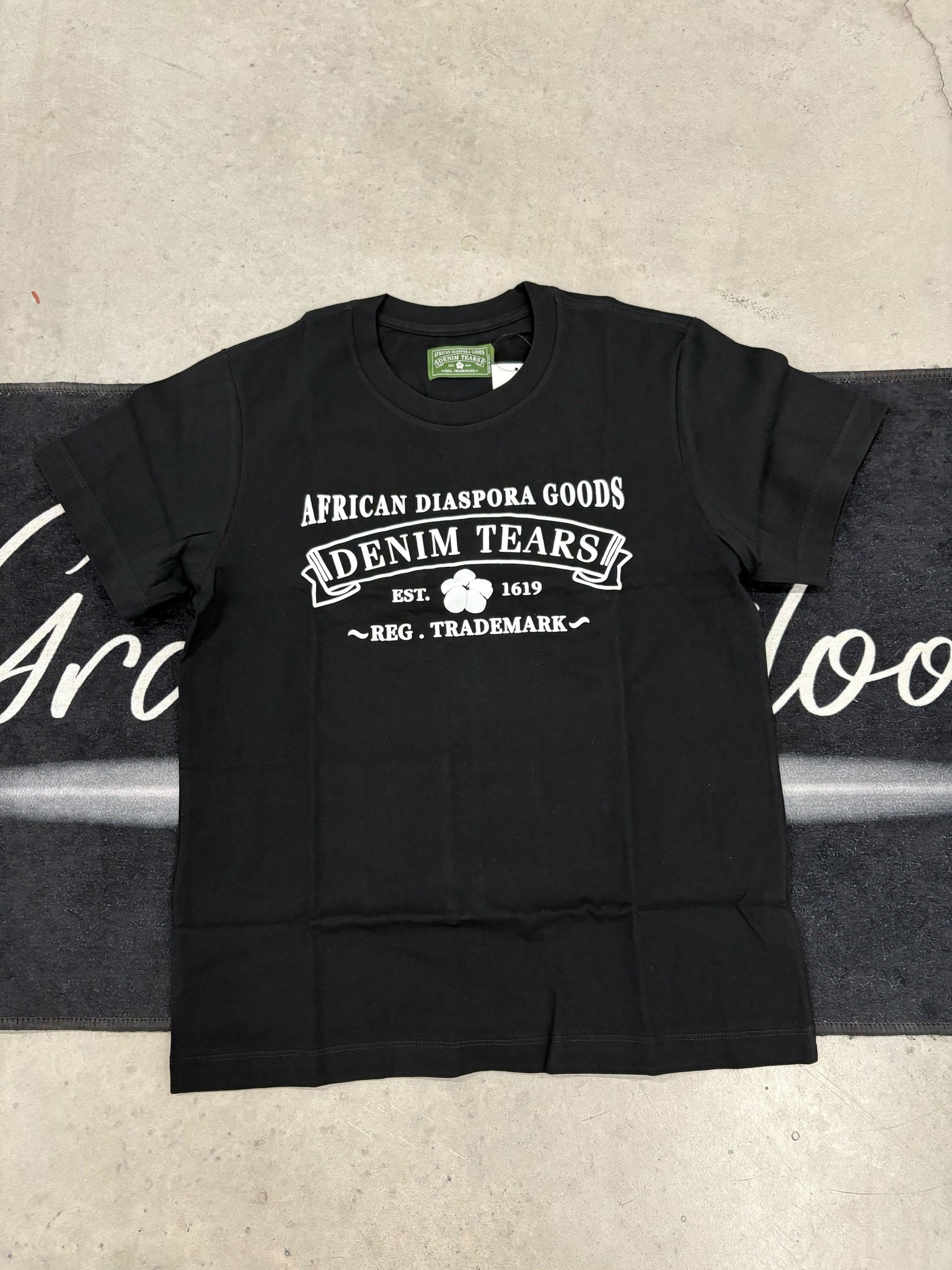 Denim Tears "African Diaspora Goods Black" shirt